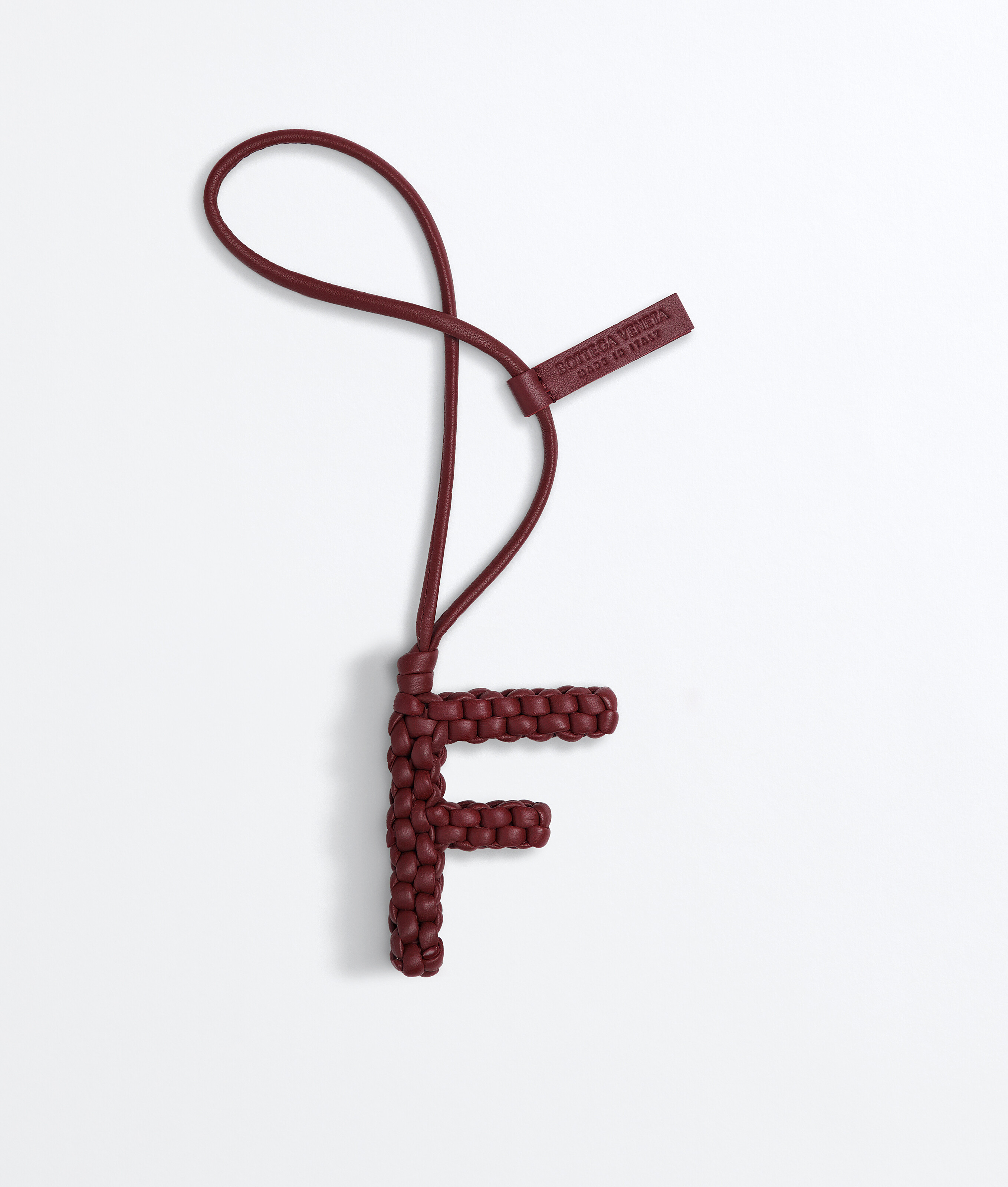 Letter F Charm in Mud Bottega Veneta Finland EN - Image 1