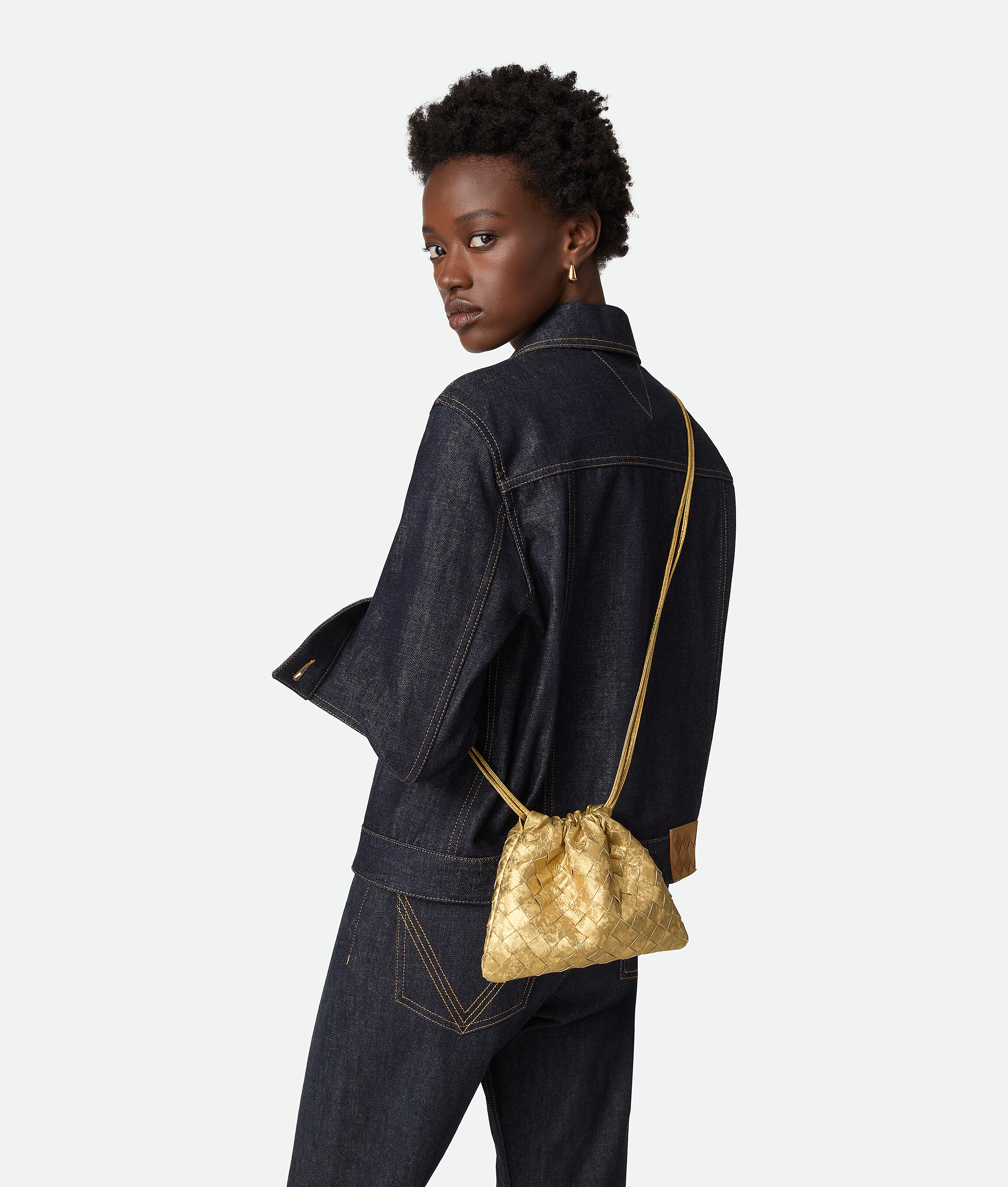 Bottega Veneta Small Leather Dustbag Clutch Bag In Gold