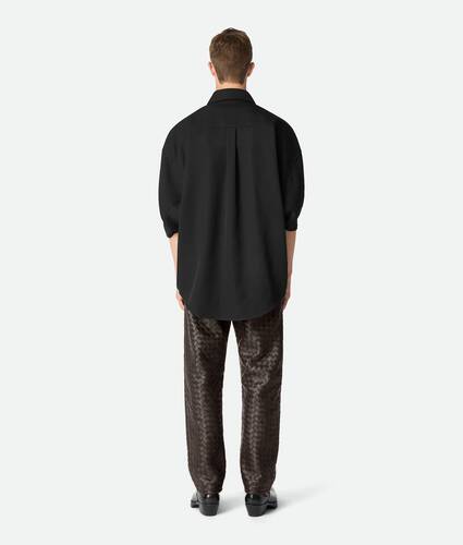Calça em couro Intrecciato