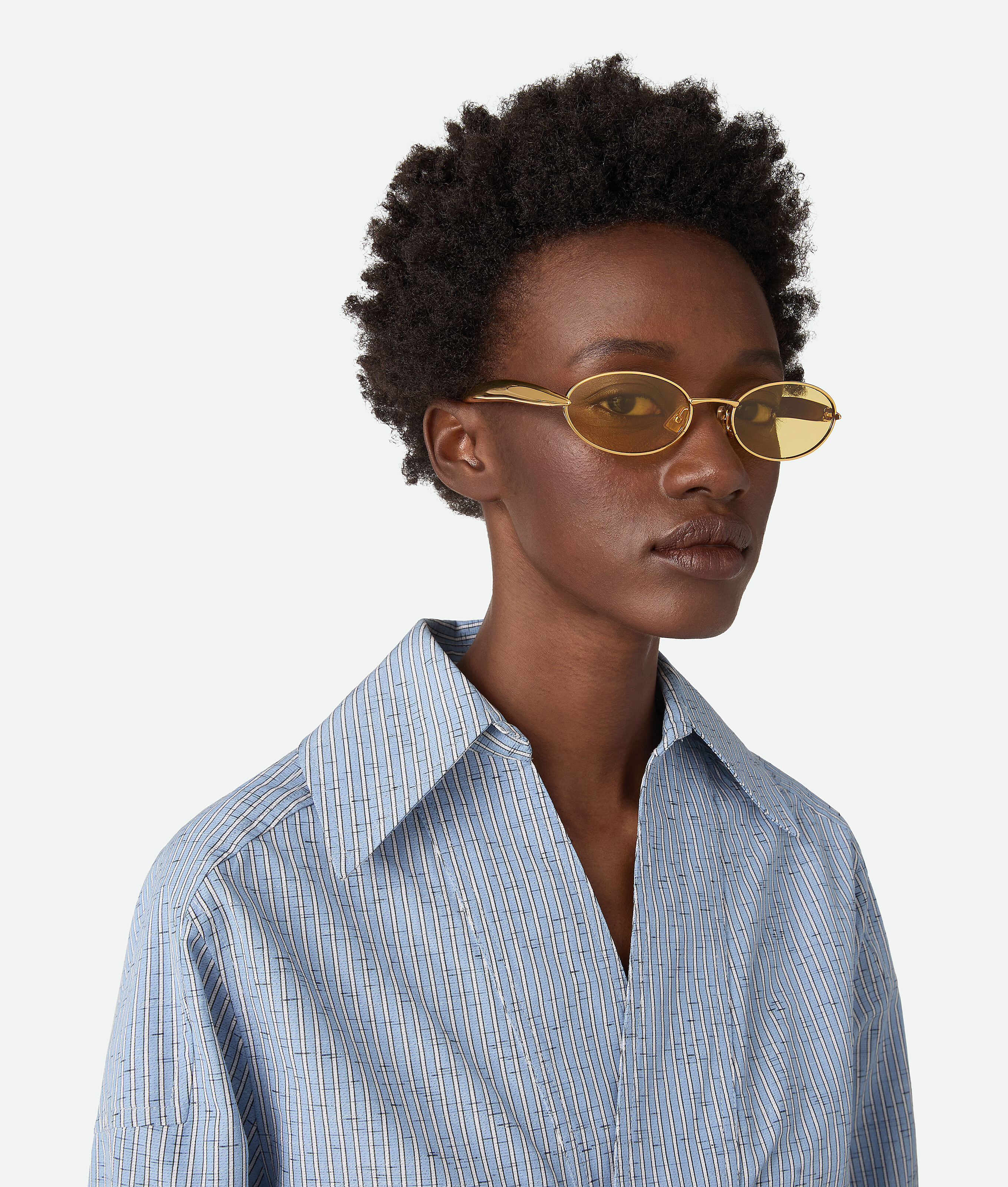 Bottega Veneta Sardine Oval Sunglasses In Gold