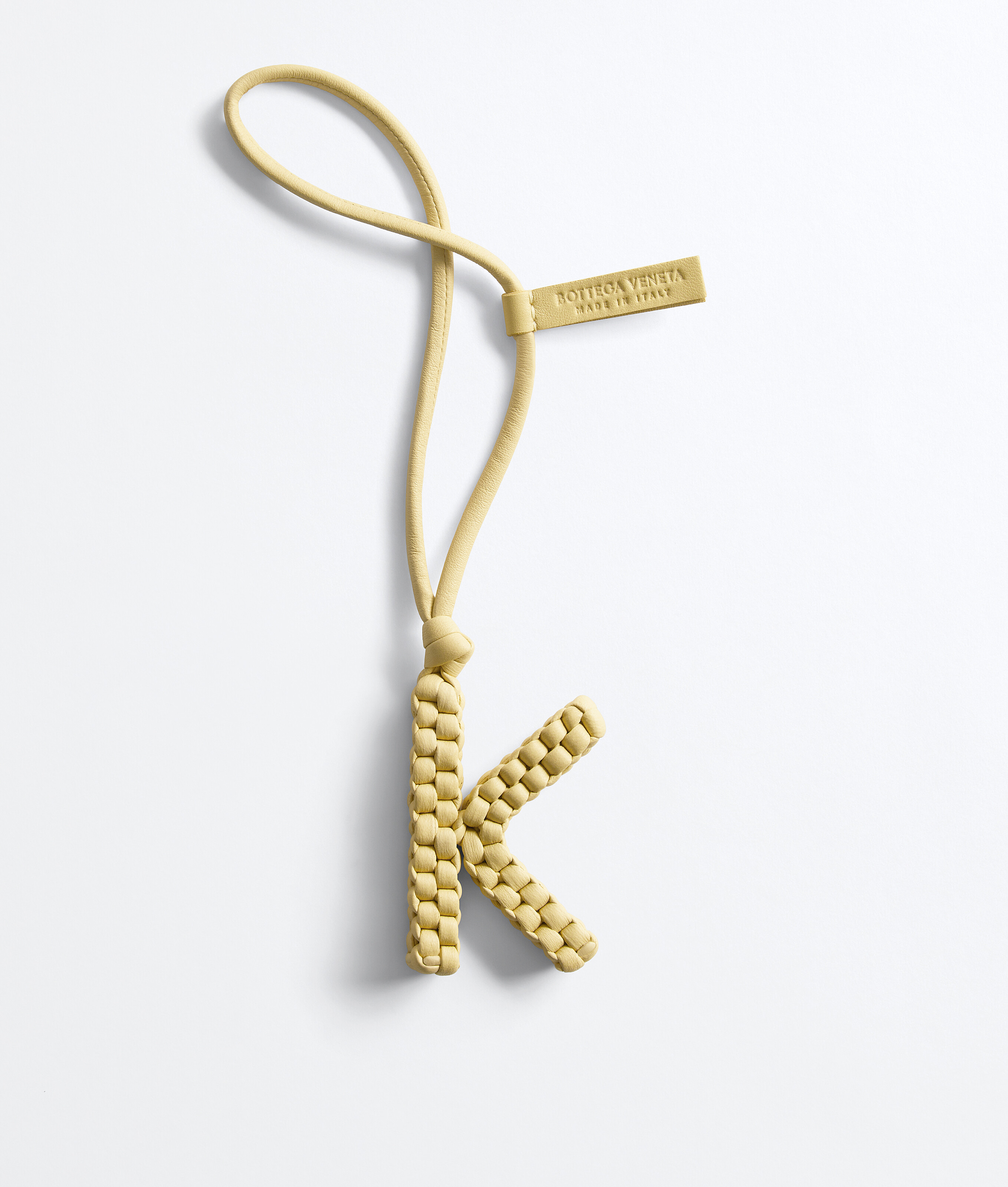 Letter K Charm in Butter Bottega Veneta Finland EN - Image 1