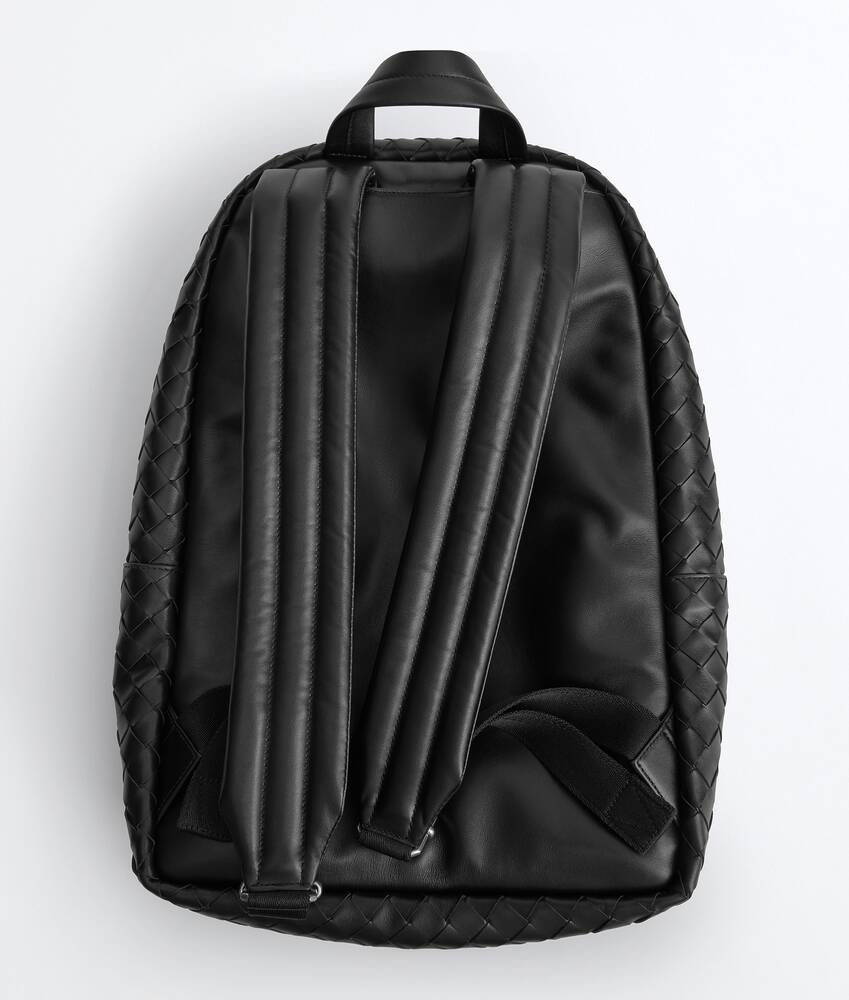 black leather quilted backpack Chanel Lambskin Drawstring The Lady Bag Crafted from smooth calfskin leather with a Y Intrecciato Backpack in Black |