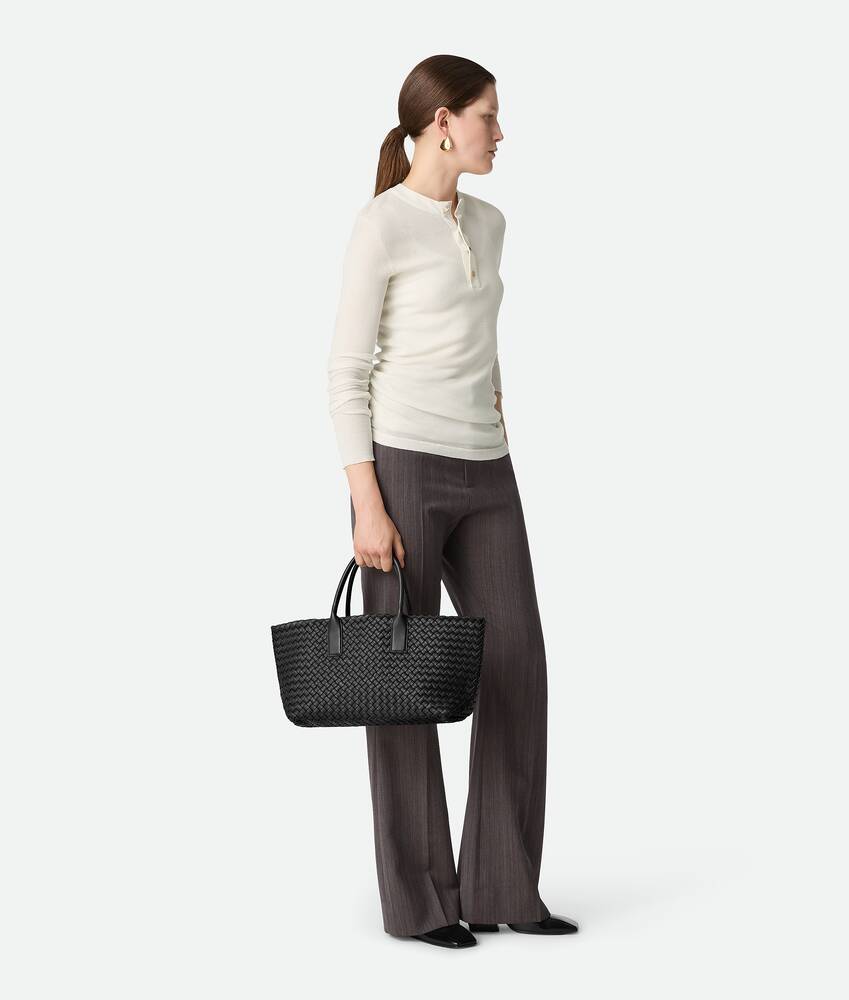 Bottega Veneta® Small Cabat in Black. Shop online now.