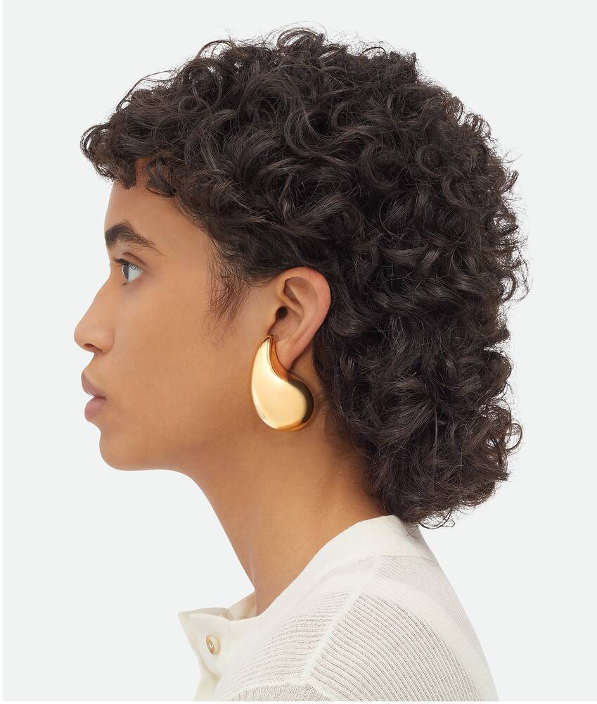 Bottega Veneta® Women’s Large Drop Earrings in Yellow gold. Shop