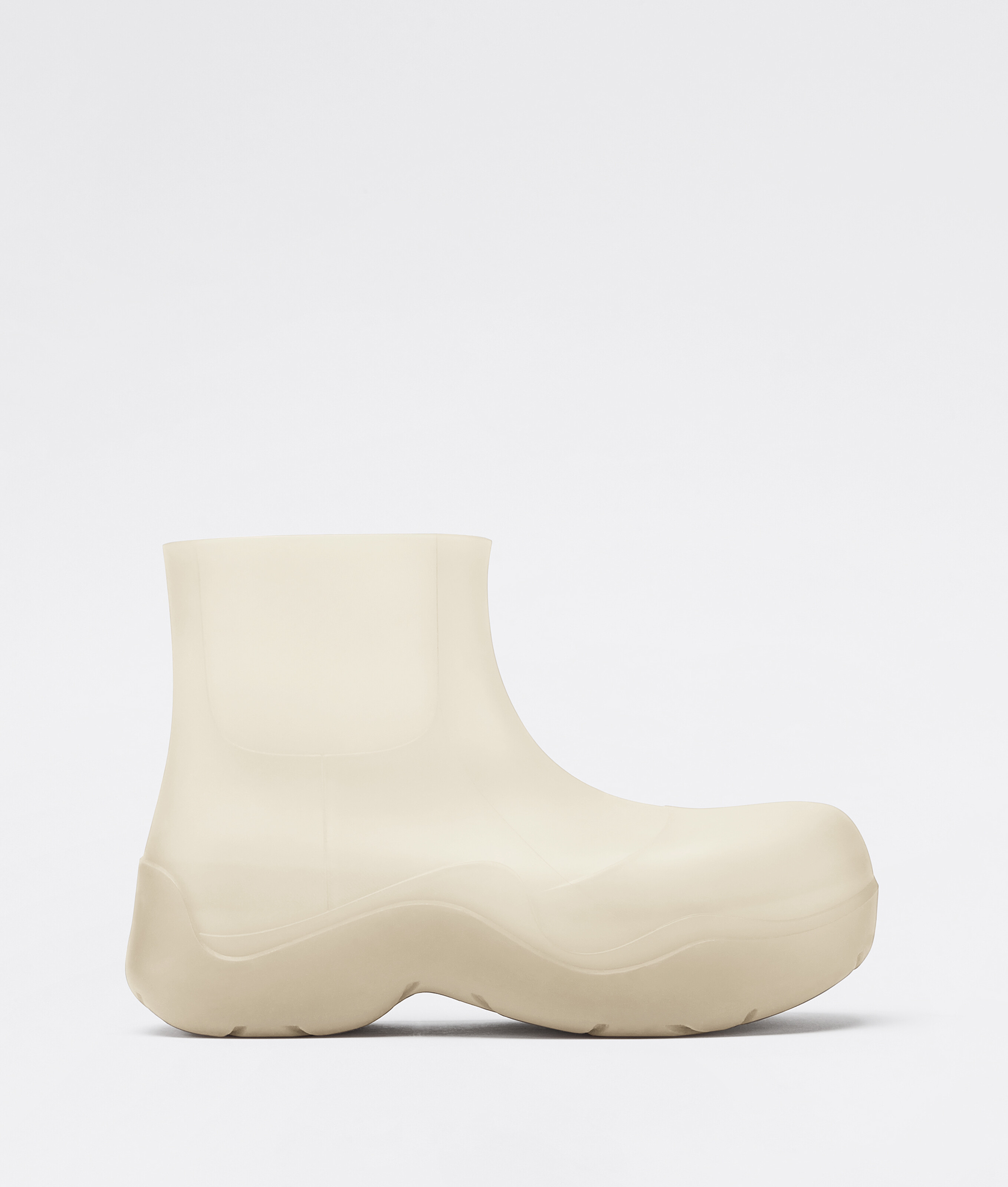 Bottega Veneta® Women's Puddle Ankle Boot in Sea Salt. Shop online