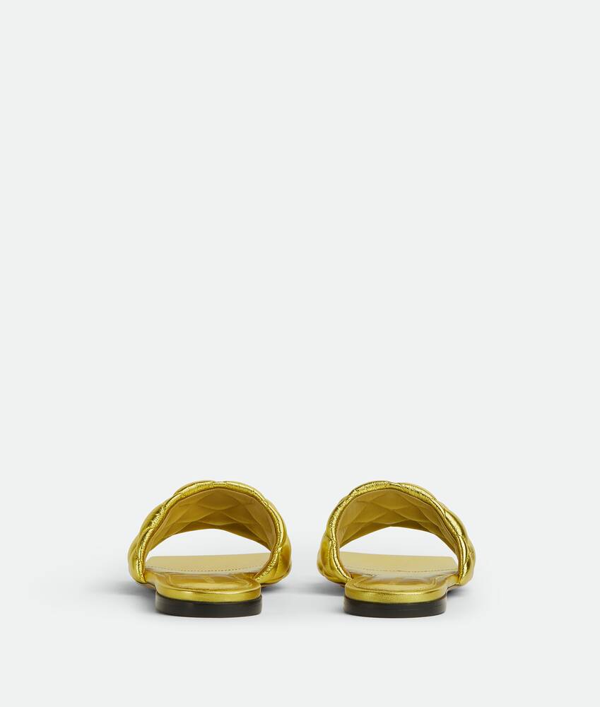 Bottega Veneta® Women's Padded Flat Sandal in Gold. Shop online now.