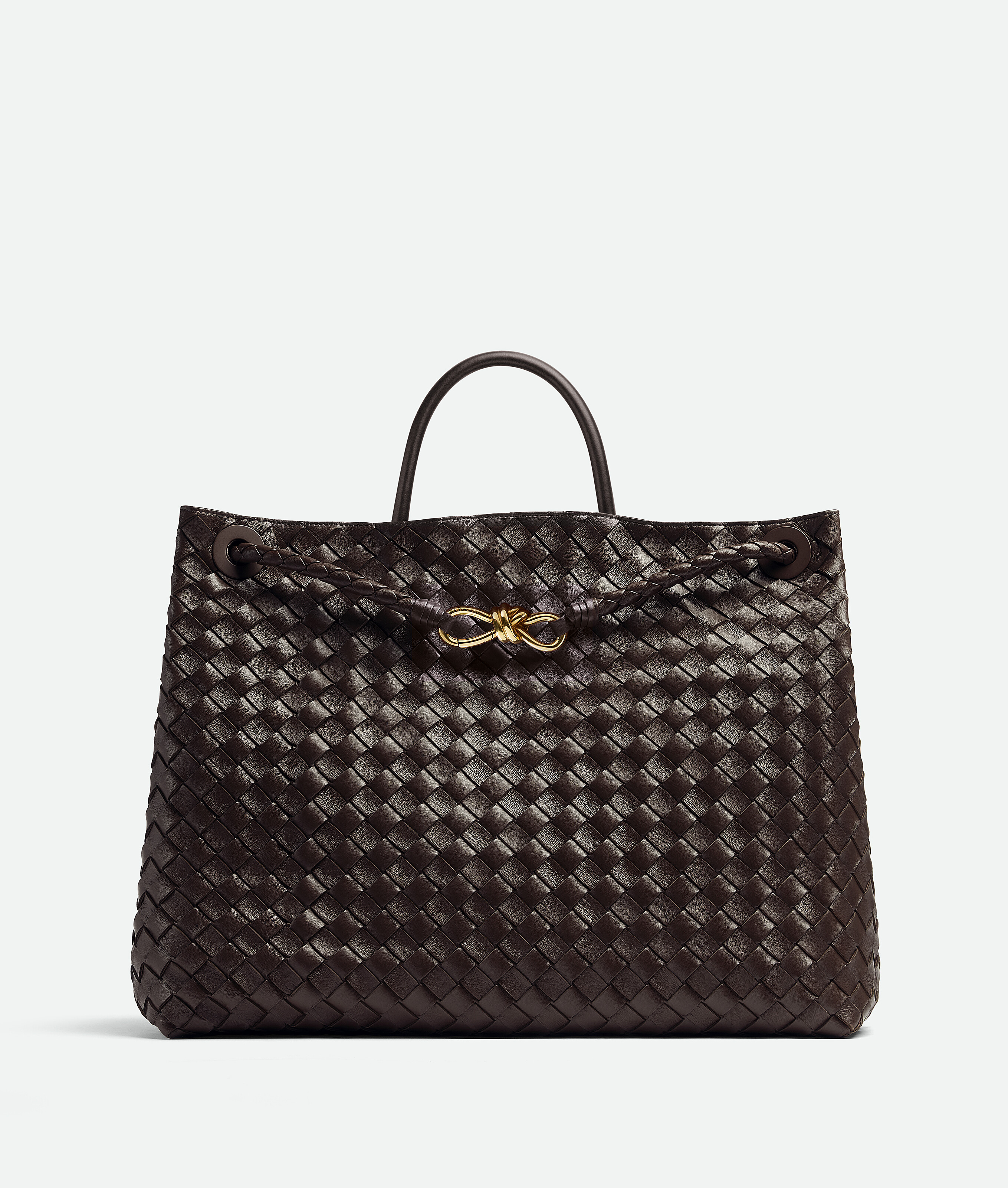 Bottega Veneta® Women's Mini Andiamo Cross-Body Bag in Fondant. Shop online  now.