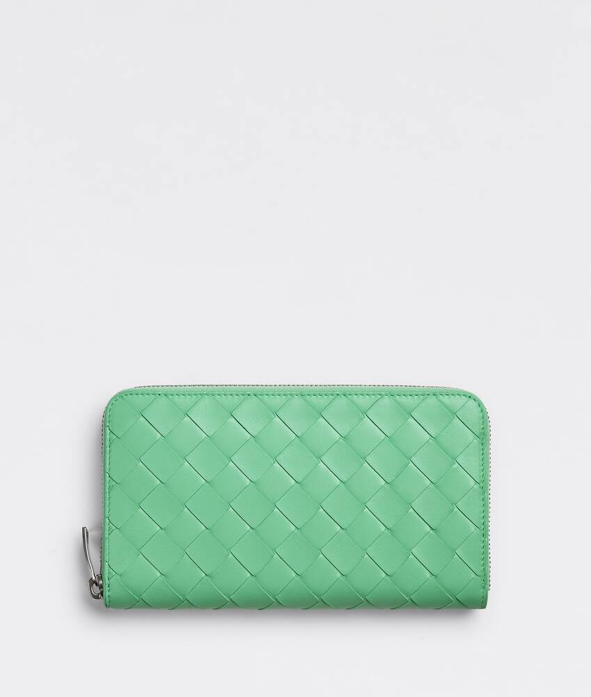 comme des garcons zip around wallet que significa