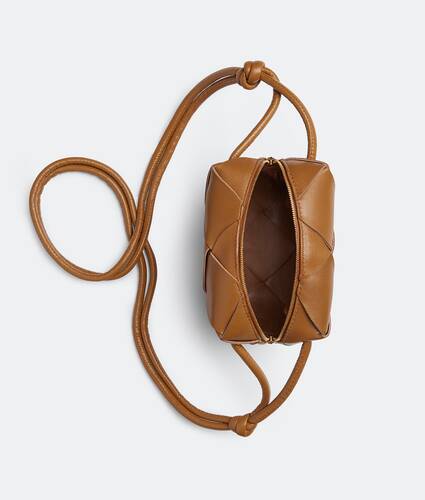 Bottega Veneta® Small Loop Camera Bag in Almond. Shop online now.