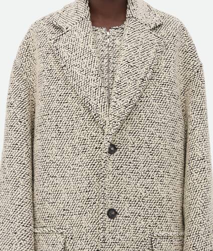 Manteau en laine bouclée bicolore