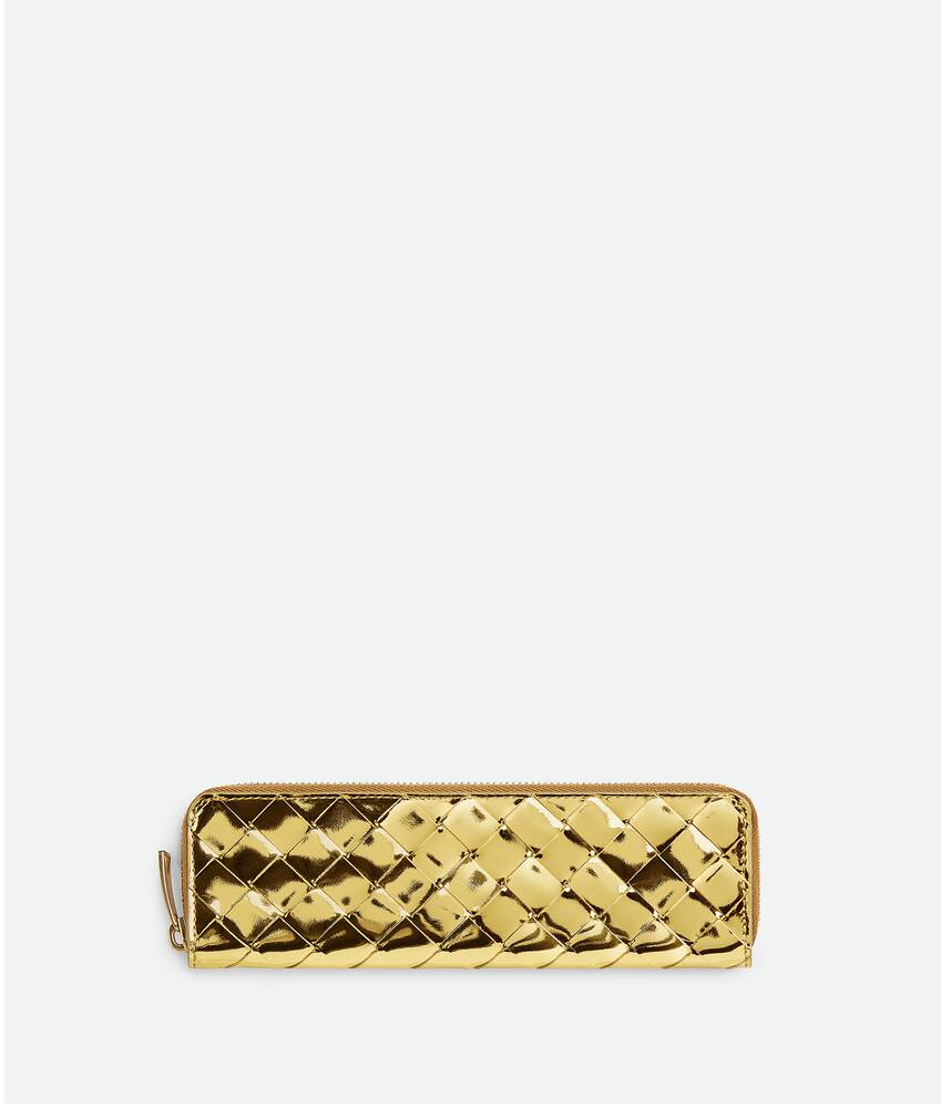 Bottega Veneta® Intrecciato Slim Pencil Case in Gold. Shop online now.