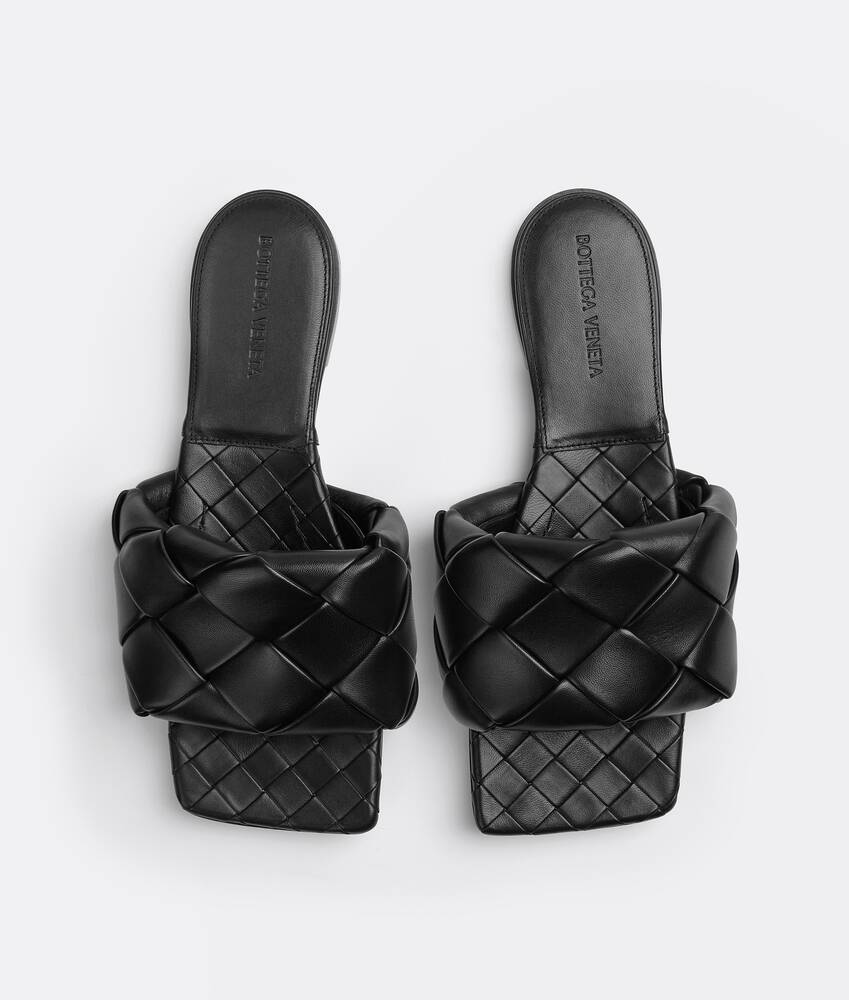 Bottega Veneta Women s Lido Flat Sandal in Black. Shop online now