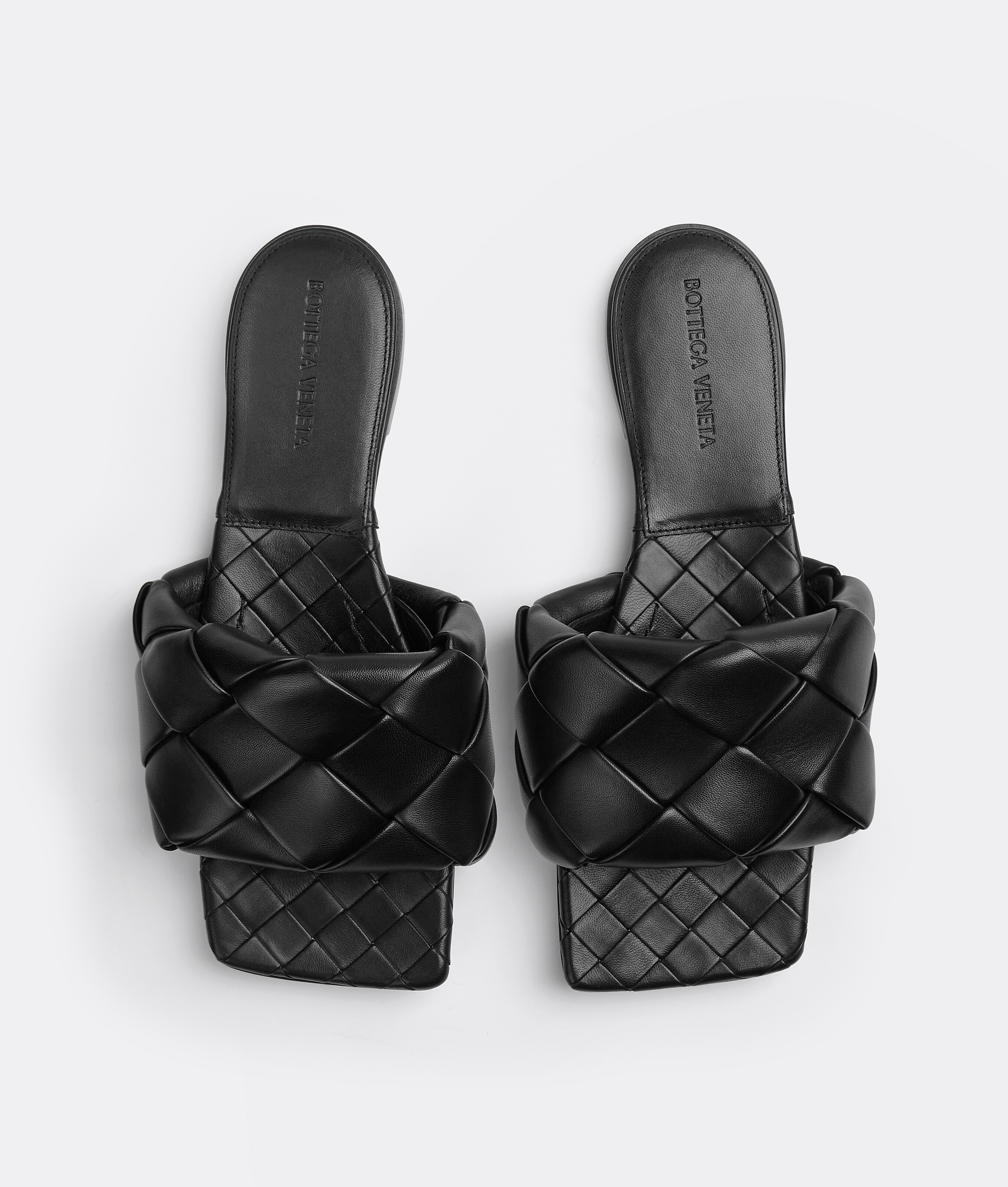 Bottega Veneta The Lido Intrecciato Leather Sandal In Black