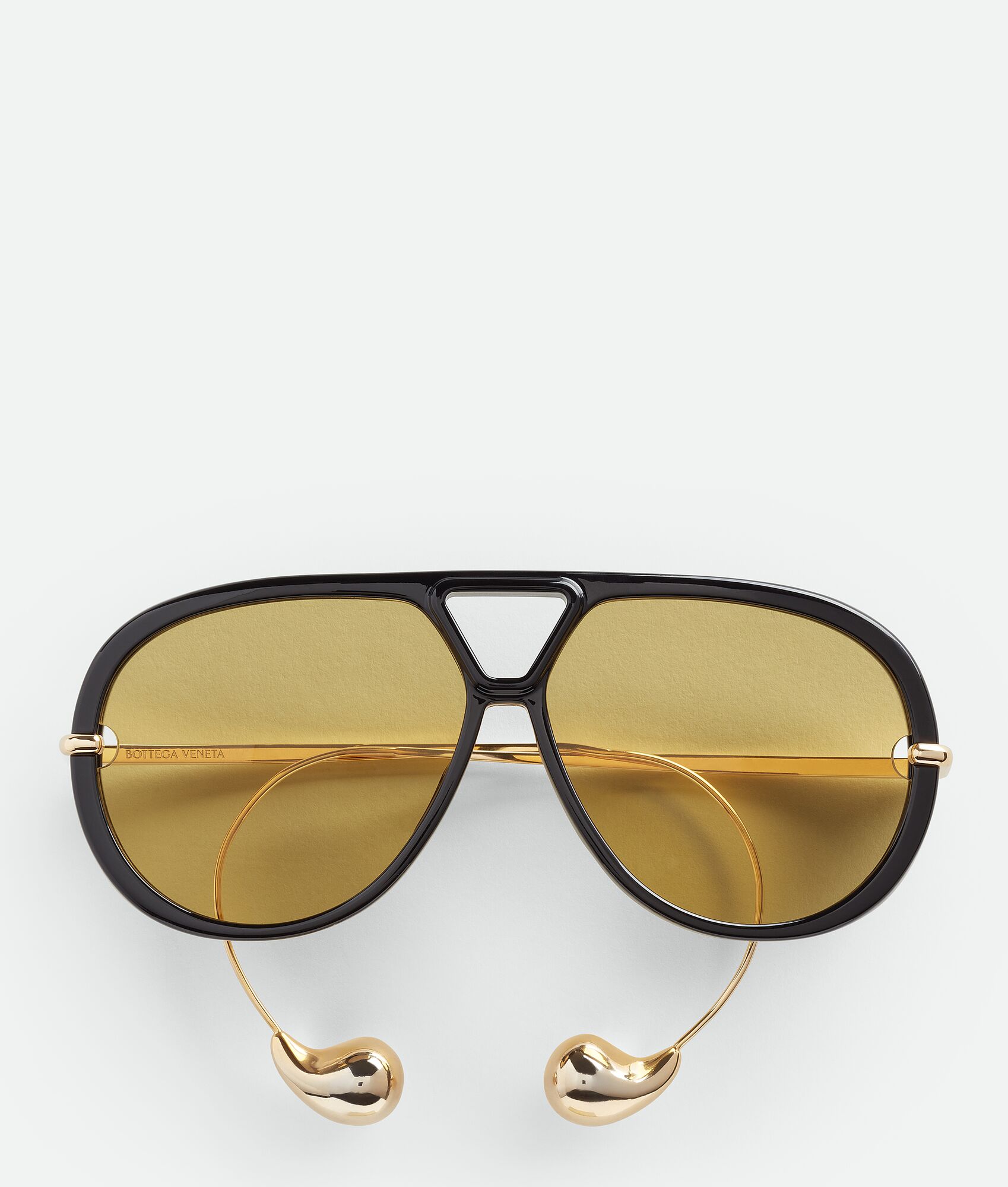 Bottega Veneta® Drop Aviator Sunglasses in Black/yellow. Shop online now.