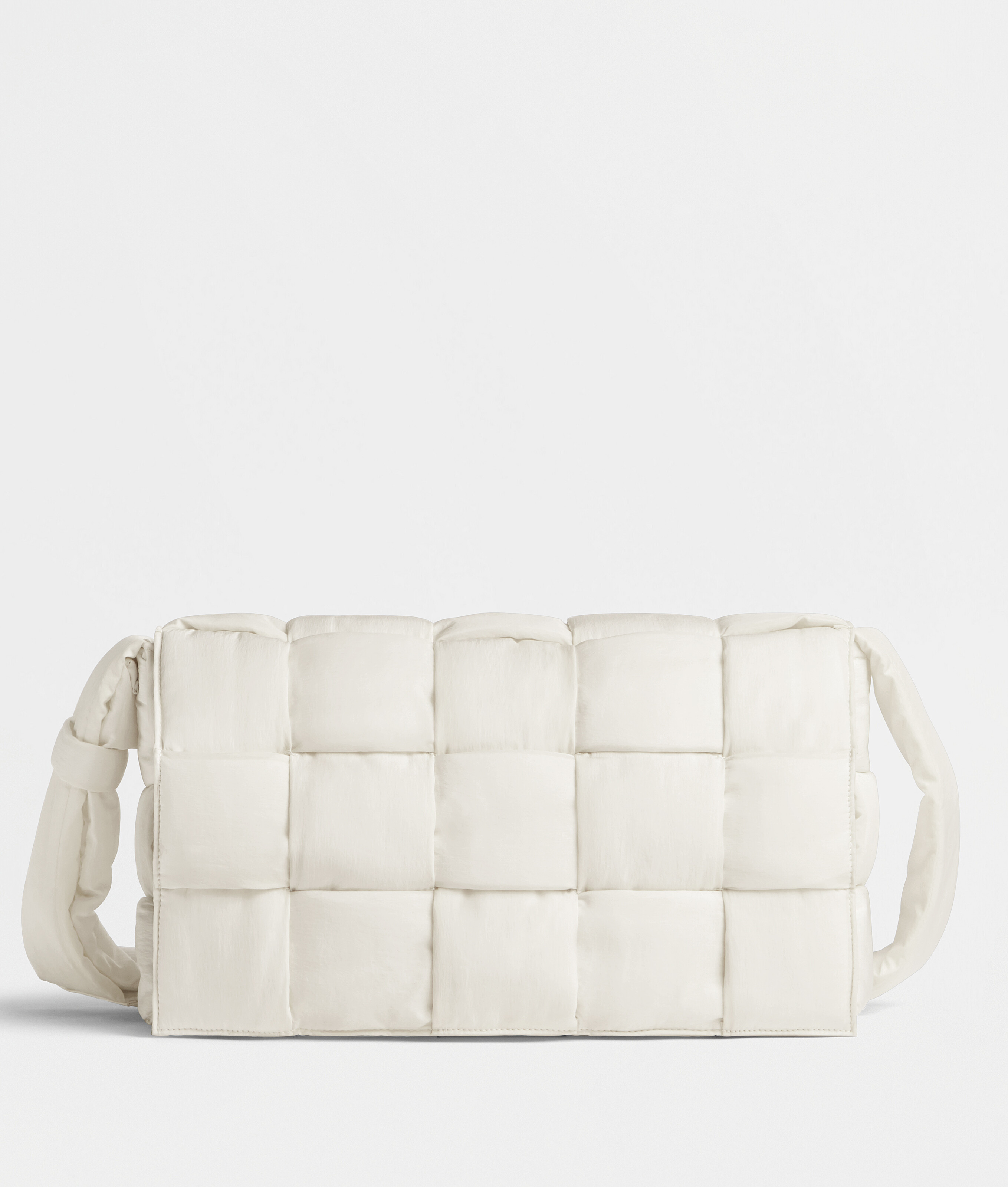 Bottega Veneta Maxi Padded Tech Cassette in White. Shop online now