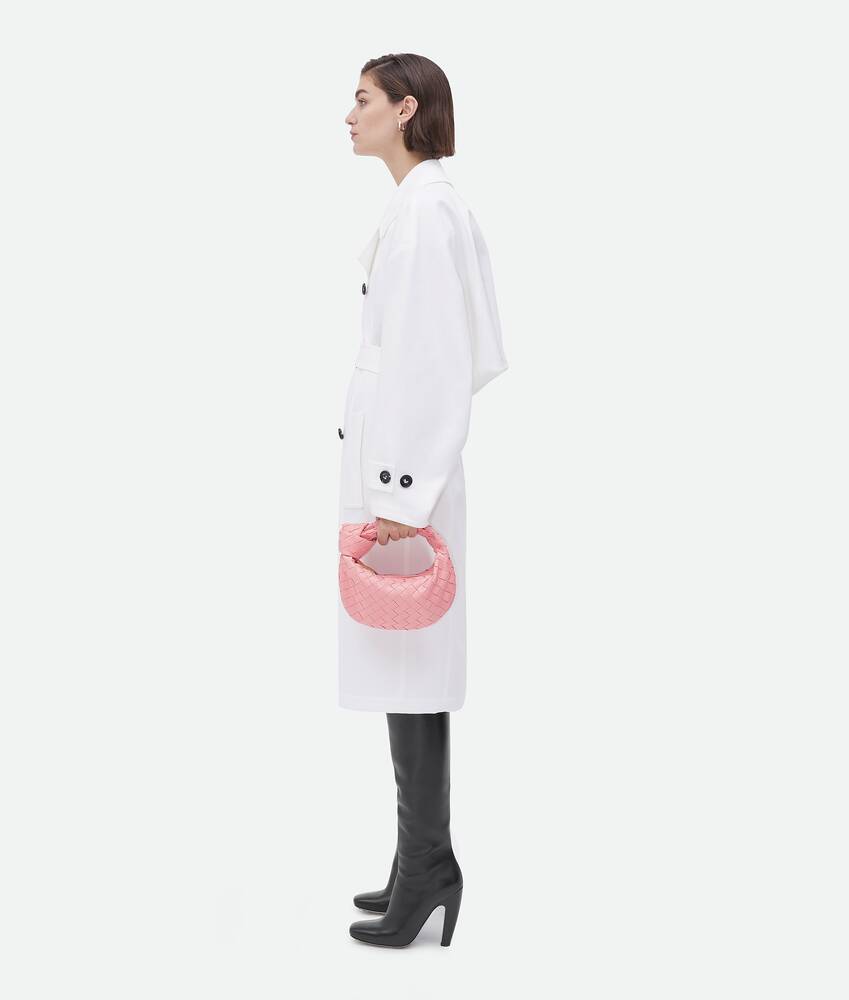 Complete your outfit with Bottega Veneta's Mini Jodie Bag 🤍 Tap to cop. ⁠  Photo: @_rebeccajackson⁠