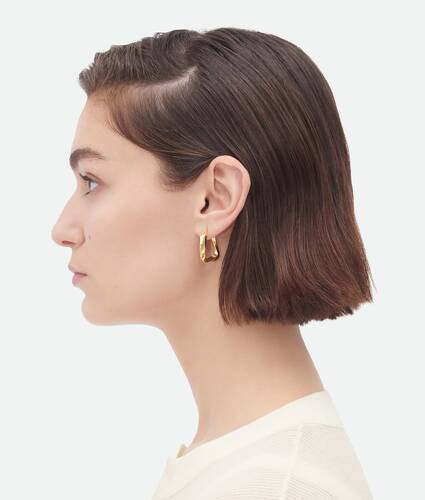 Bottega Veneta® Women's Triangle Hoop Earrings in Silver. Shop online now.