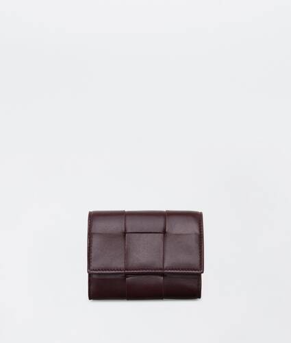 Bottega Veneta® Women's Tri-fold Flap Wallet in Nero. Shop online now.