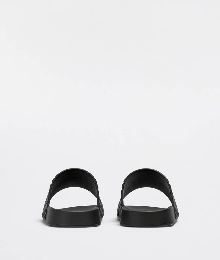 Bottega Veneta® Men's Slider in Black. Shop online now.