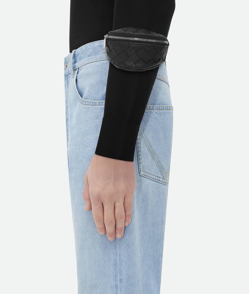 Bottega Veneta® Men's Intrecciato Wrist Pouch in Black. Shop