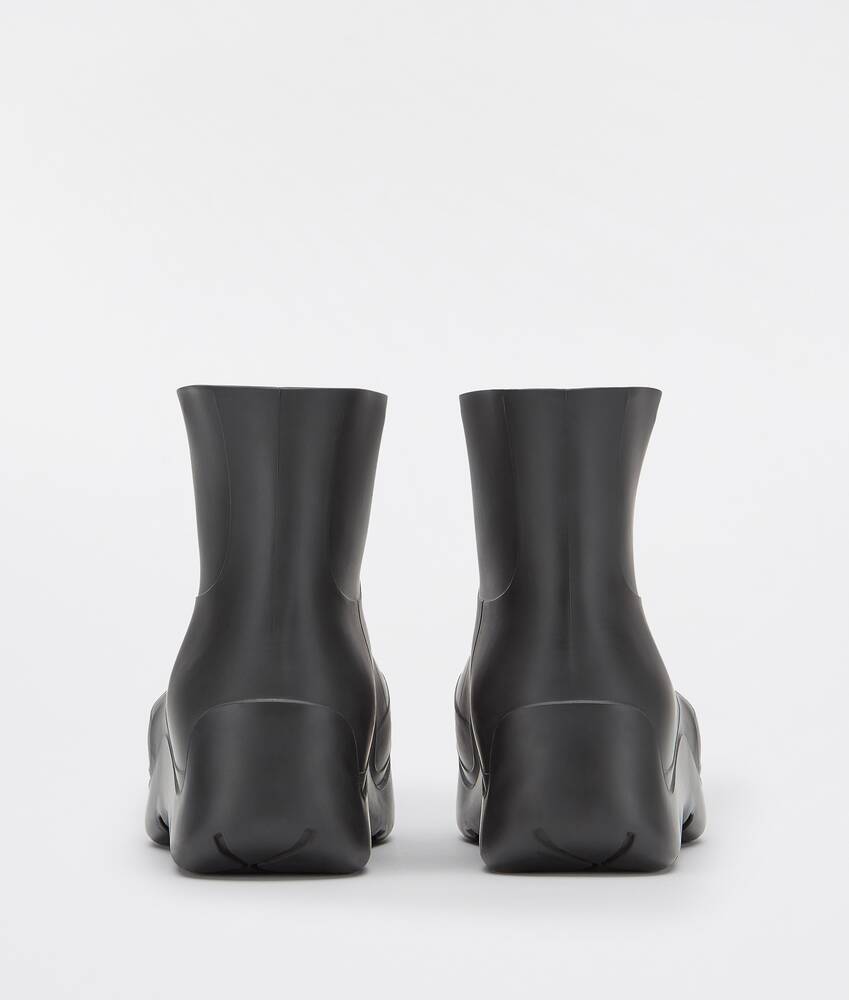 Bottega Veneta® Women's Puddle Ankle Boot in Black. Shop online now.