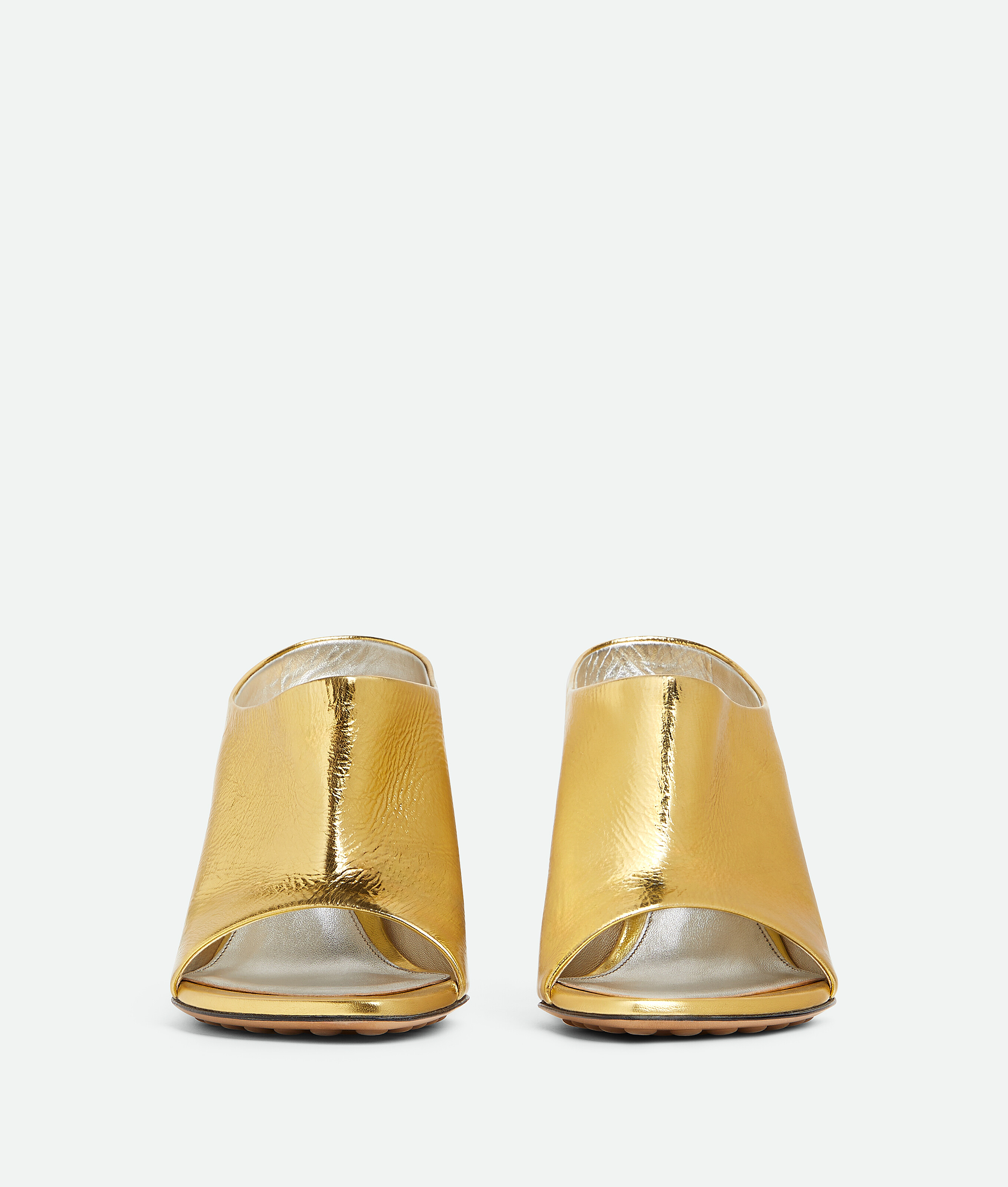 Shop Bottega Veneta Rana Mules In Gold
