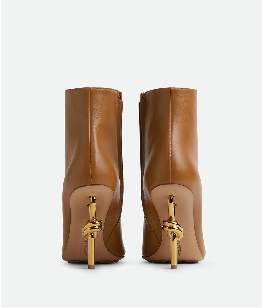 Bottega Veneta® Women's Knot Ankle Boot in Wood. Shop online now.
