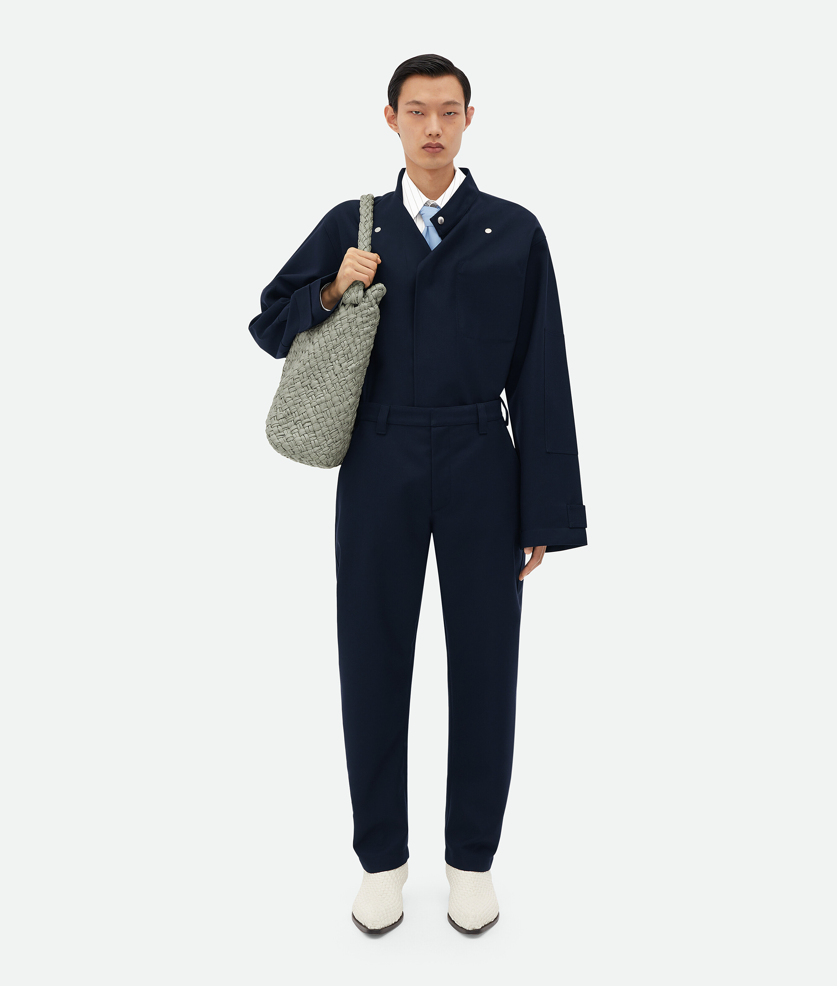 Shop Bottega Veneta Bonded Wool And Cotton Tapered Trousers In Blue