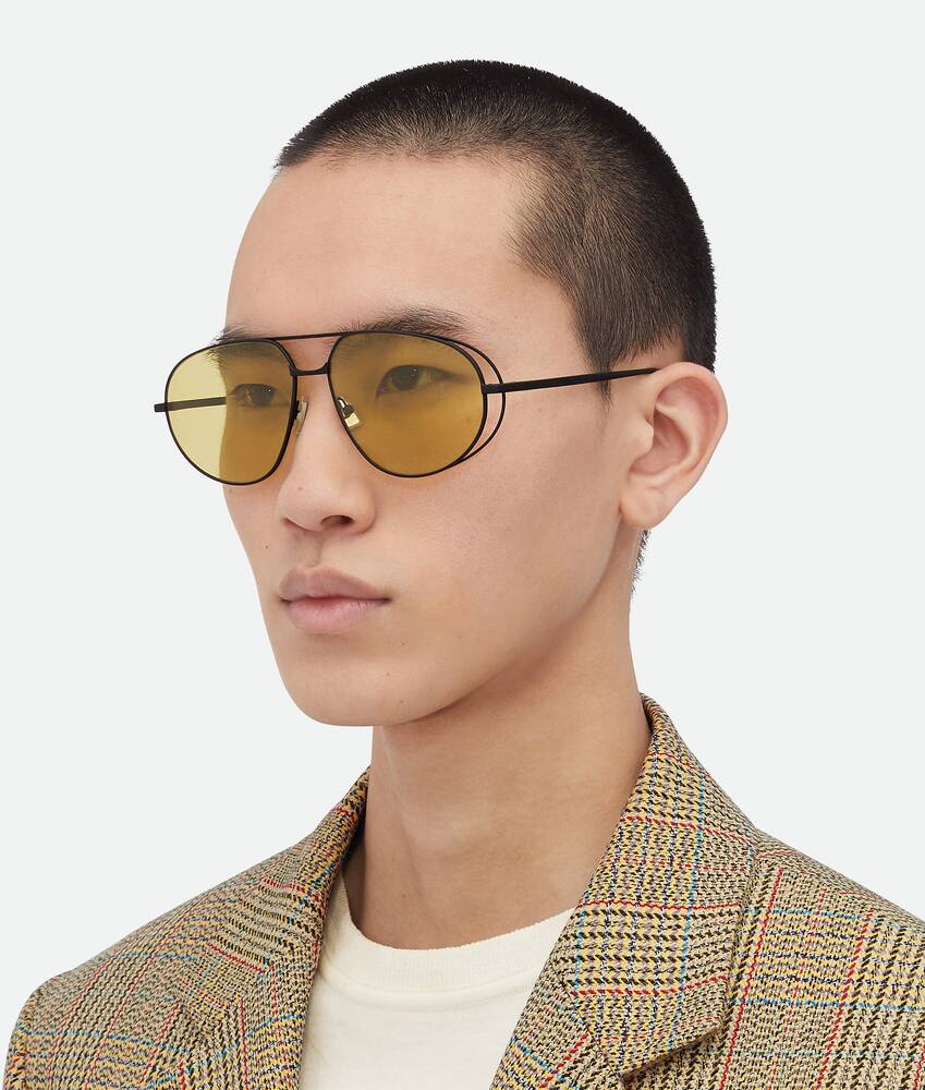 Bottega Veneta Classic Aviator Sunglasses in Black yellow. Shop online now