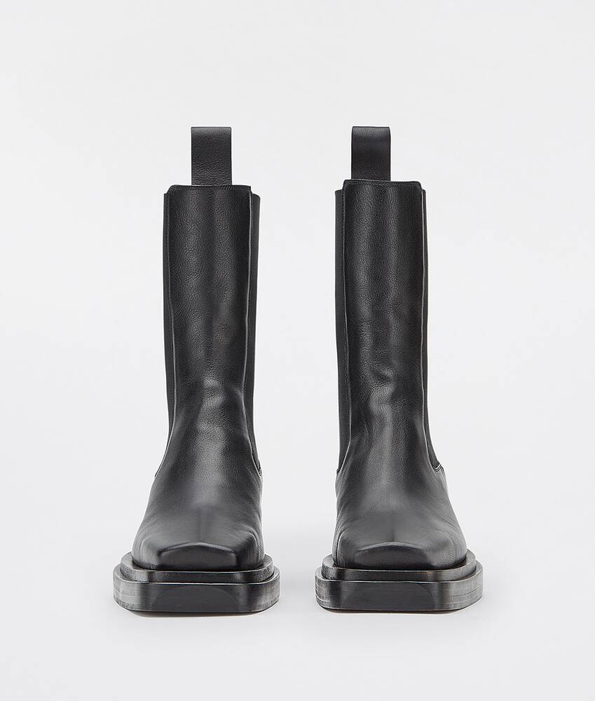 Bottega Veneta® Women's Puddle Ankle Boot in Black. Shop online now.