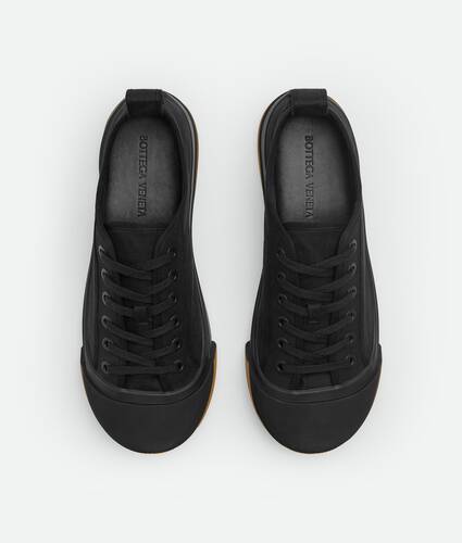 Tyranny Anonym kilometer Bottega Veneta® Men's Plat Sneaker in Black. Shop online now.