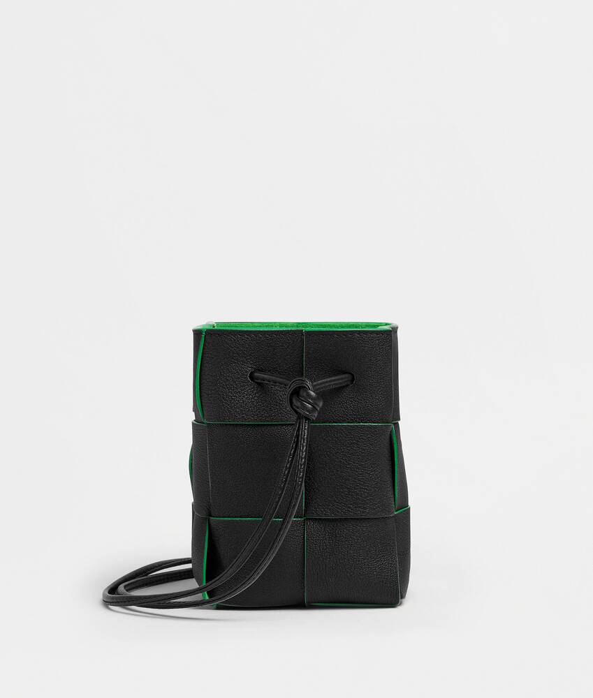 Bottega Veneta® Mini Cassette Bucket Bag in Black / Parakeet. Shop