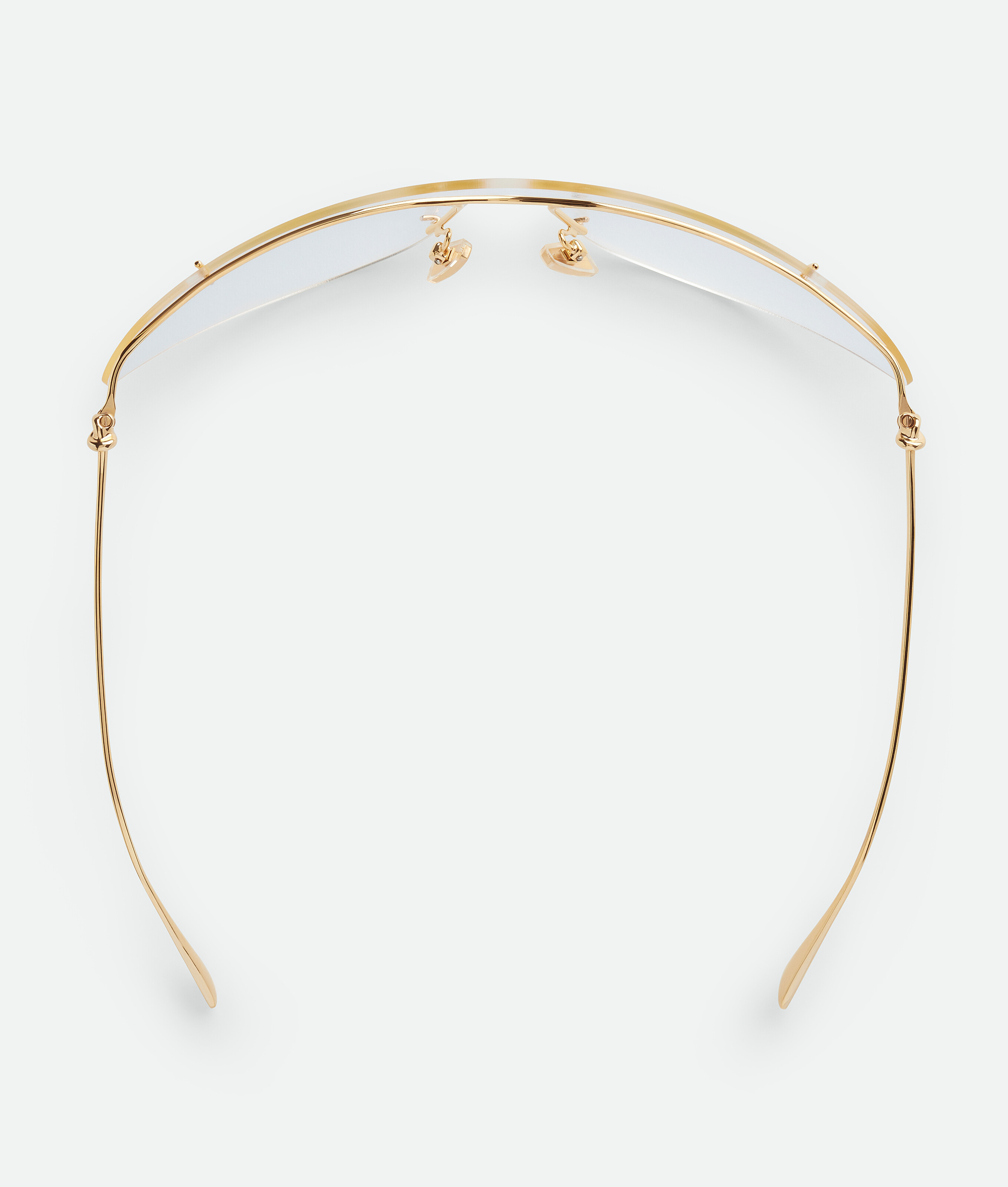 Shop Bottega Veneta Knot Shield Sunglasses In Gold