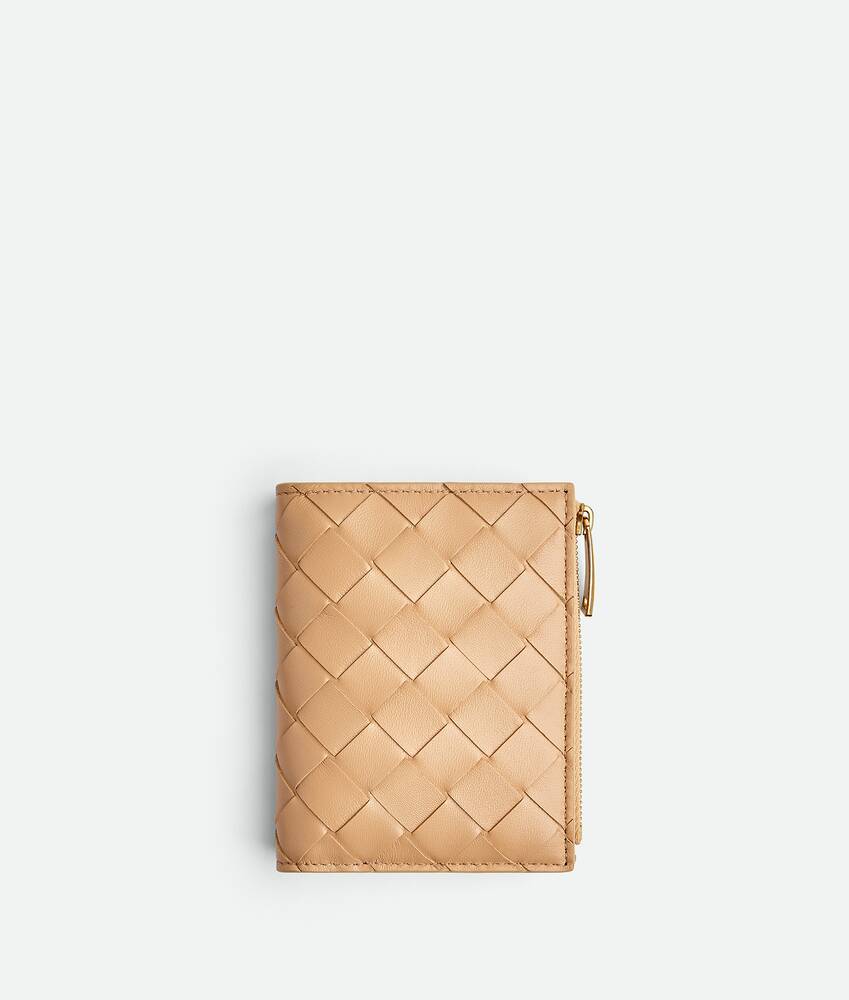 Bottega Veneta® Mini Pouch in Almond. Shop online now.