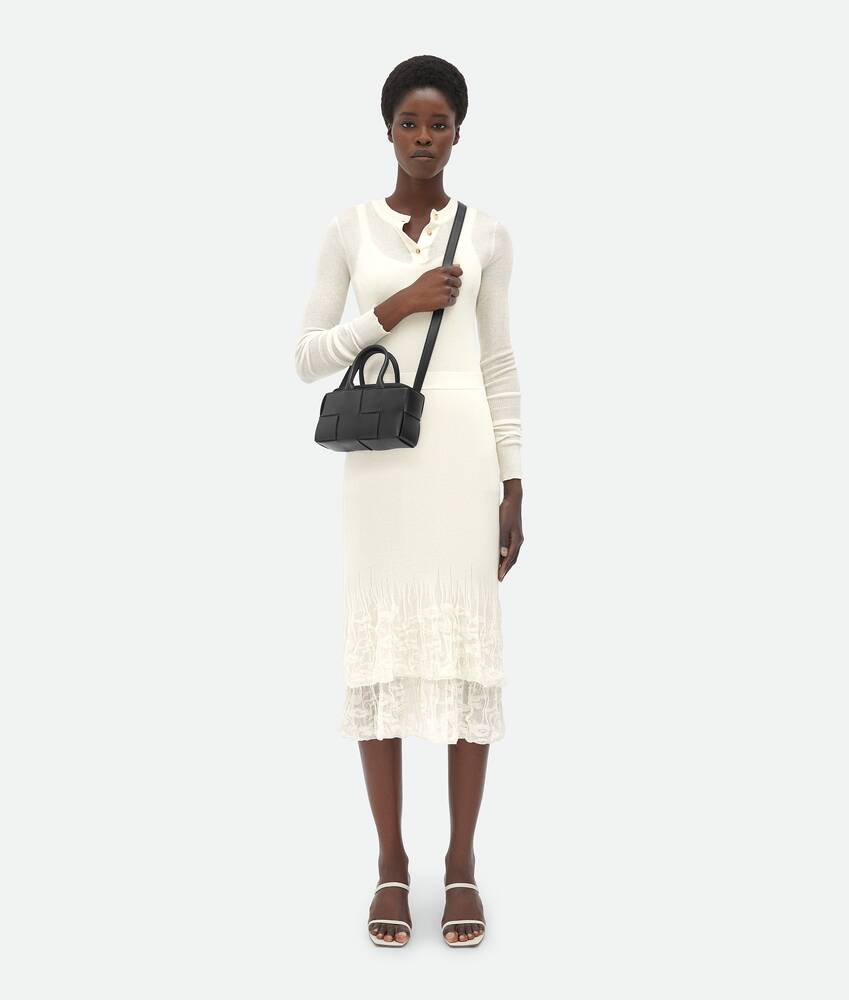 Bottega Veneta® Women's Mini East-West Arco Tote in Black. Shop online now.
