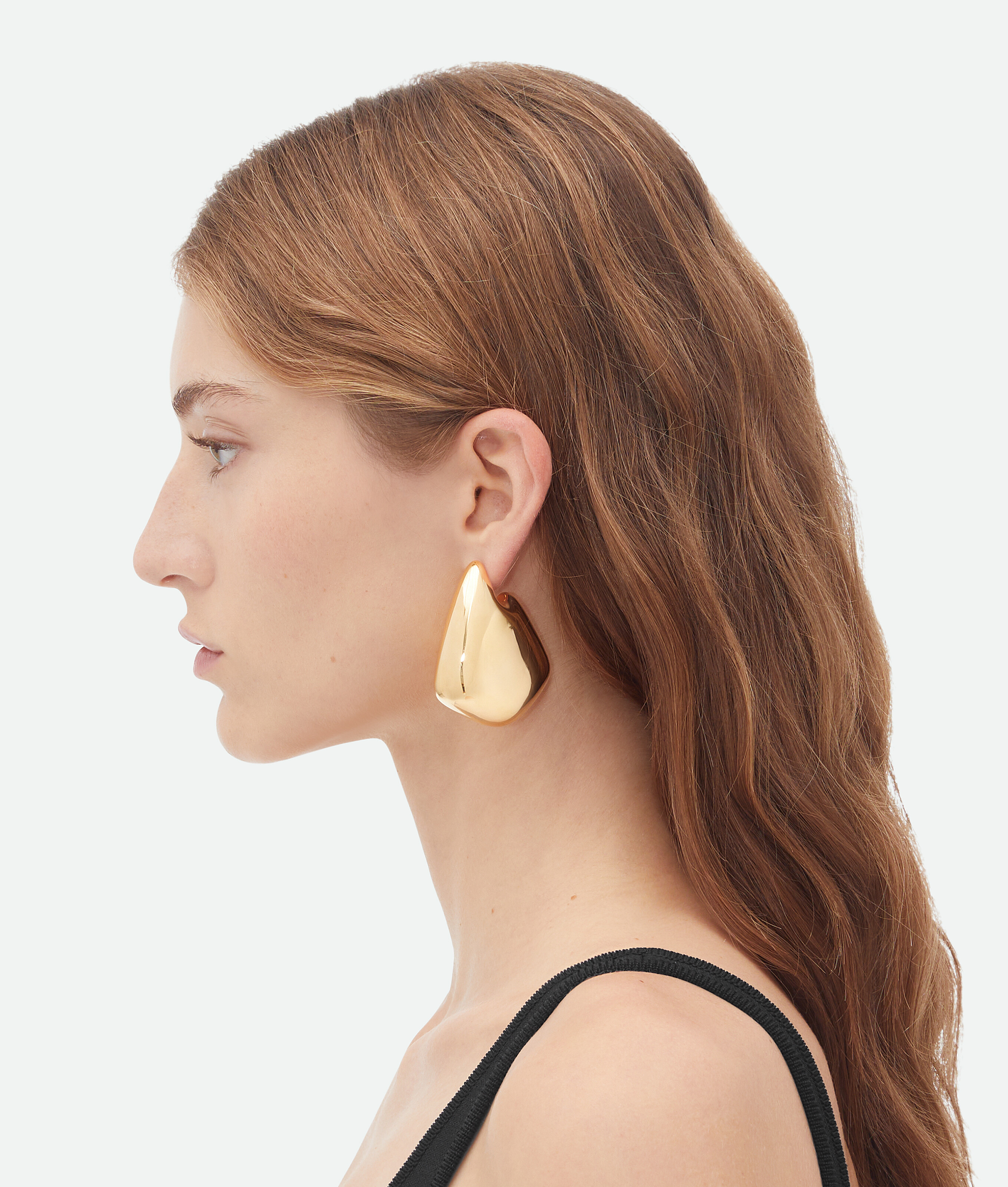Shop Bottega Veneta Large Fin Earrings In Gold