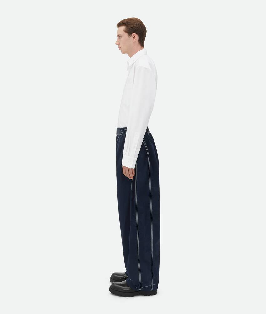 Bottega Veneta® Men's Elasticated Tech Nylon Trousers in Navy. Shop online  now.