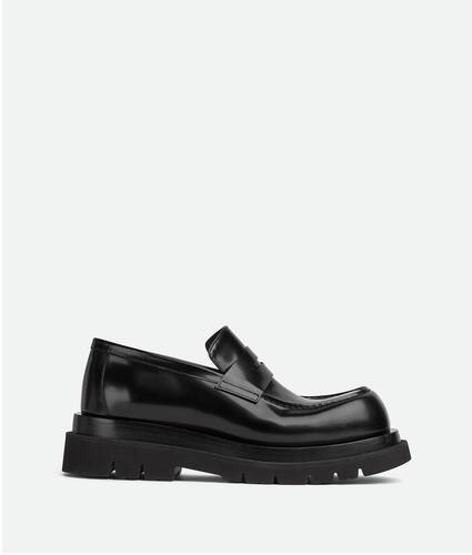 Bottega Veneta® Men's Haddock Boat Shoe in Black. Shop online now.