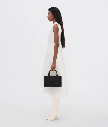 Bottega Veneta® Mini Arco Tote Bag in Black. Shop online now.