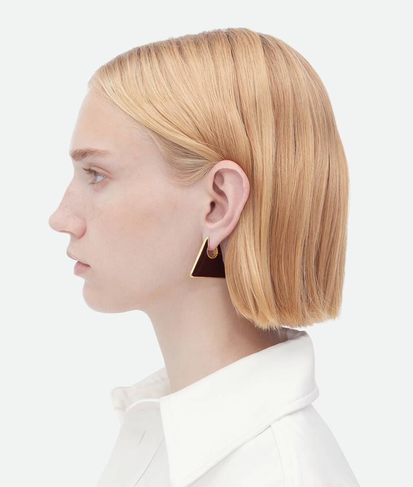 Bottega Veneta® Women's Triangle Hoop Earrings in Silver. Shop online now.