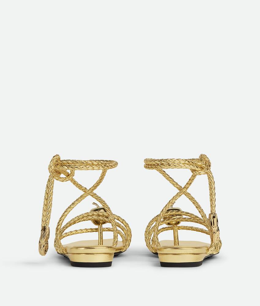 Bottega Veneta® Women's Adam Flat Sandal in Gold. Shop online now.