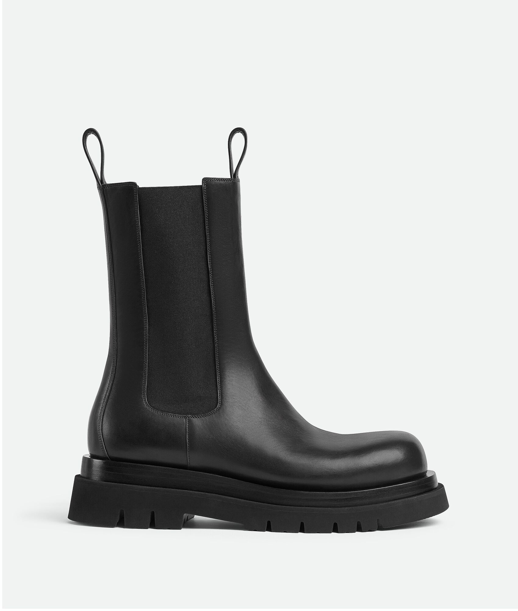 Bottega Veneta® Men's Puddle Ankle Boot in Sea Salt. Shop online now.