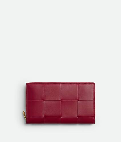 Bottega Veneta Women s Cassette Zip Around Wallet in Dark red Bliss washed. Shop online now