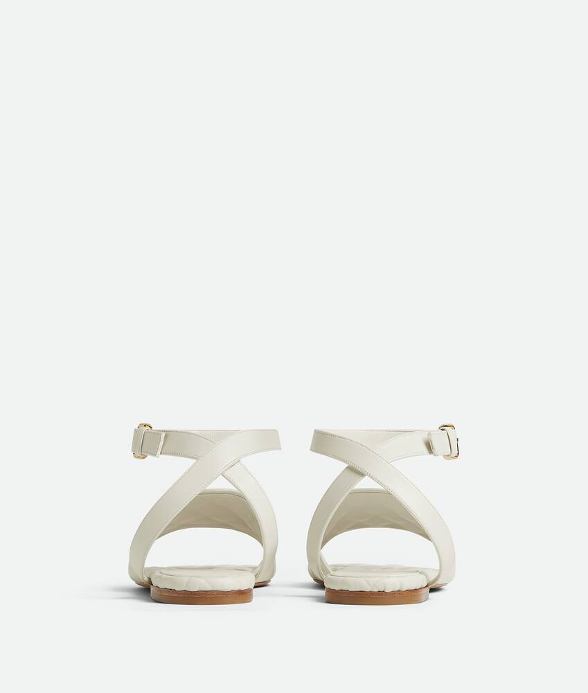 Bottega Veneta® Women's Amy Flat Sandal in String. Shop online now.