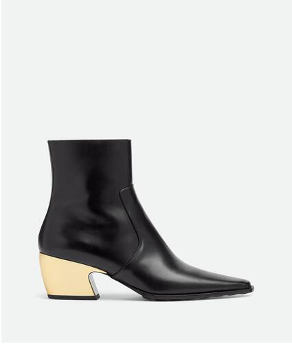 Bottega Veneta® Women's Tex Boot in Black/gold. Shop online now.