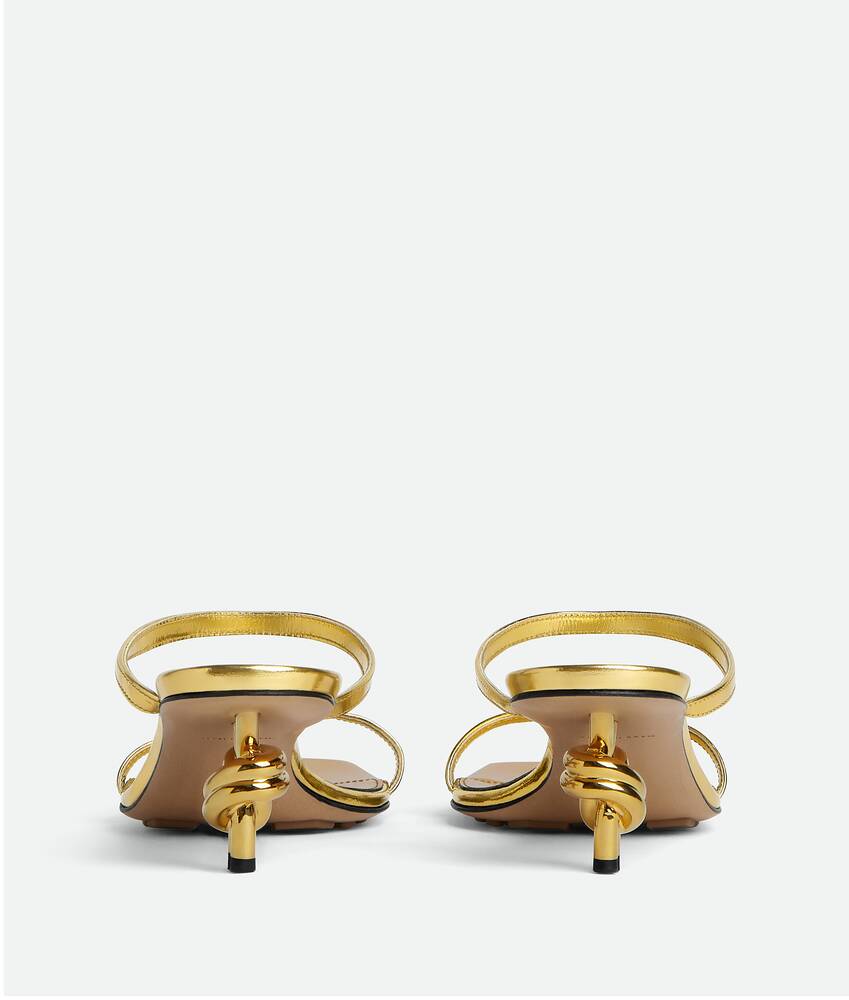 Bottega Veneta® Women's Knot Mule in Gold. Shop online now.