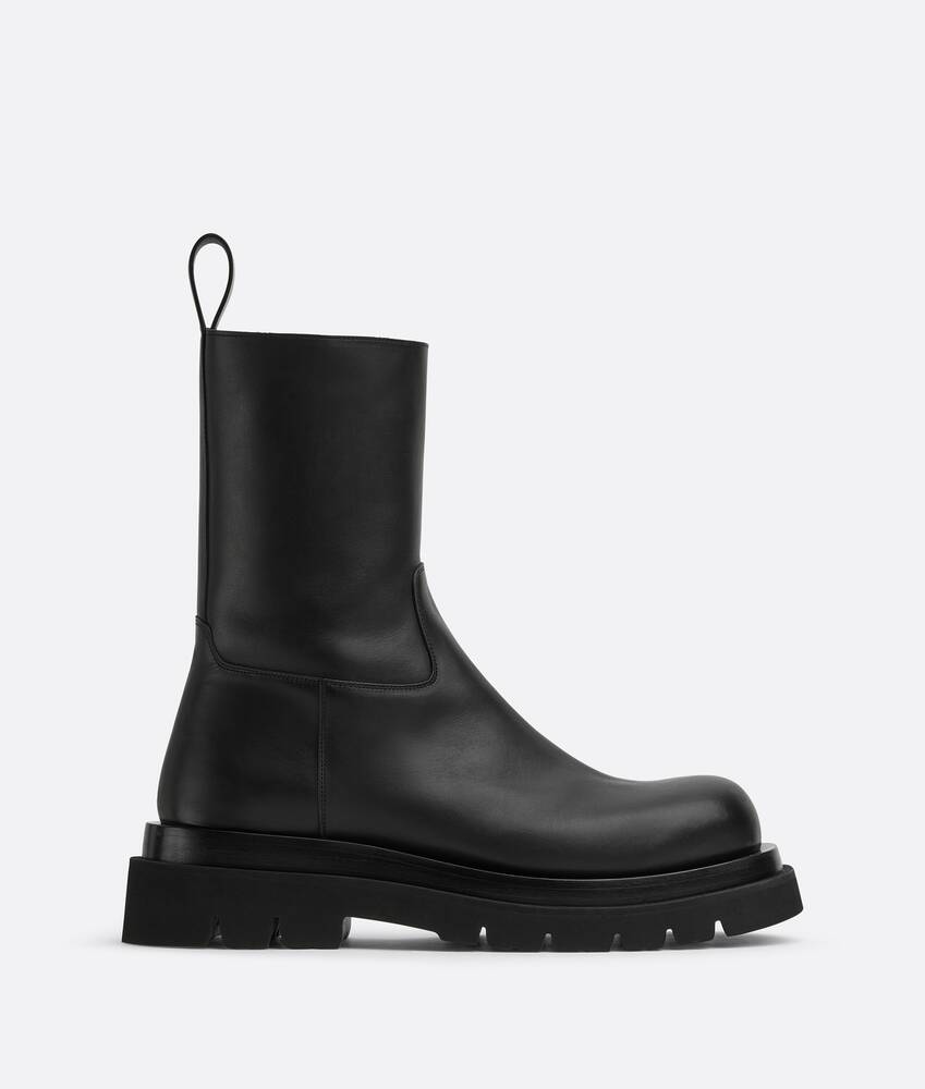 Bottega Veneta® Men's Lug Boot in Black. Shop online now.