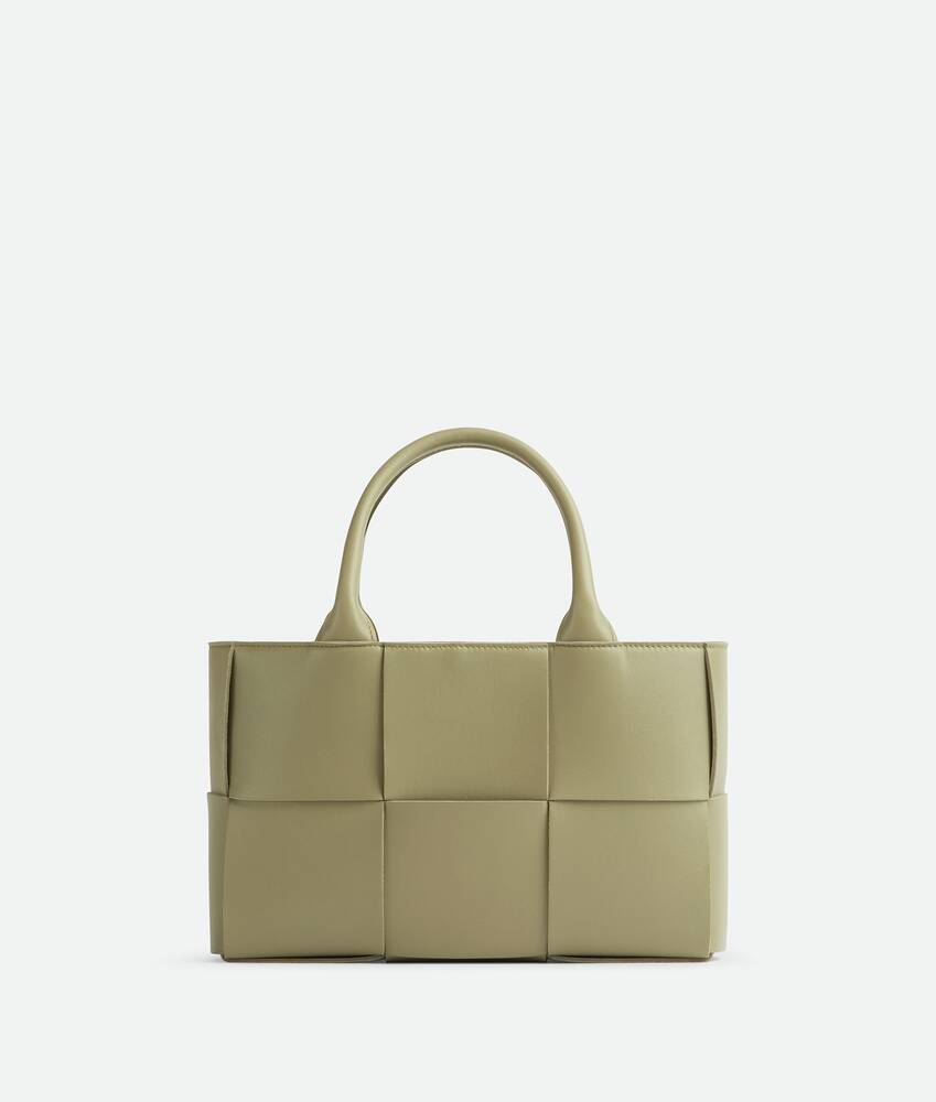 Bottega Veneta® Mini Arco Tote Bag in Travertine. Shop online now.