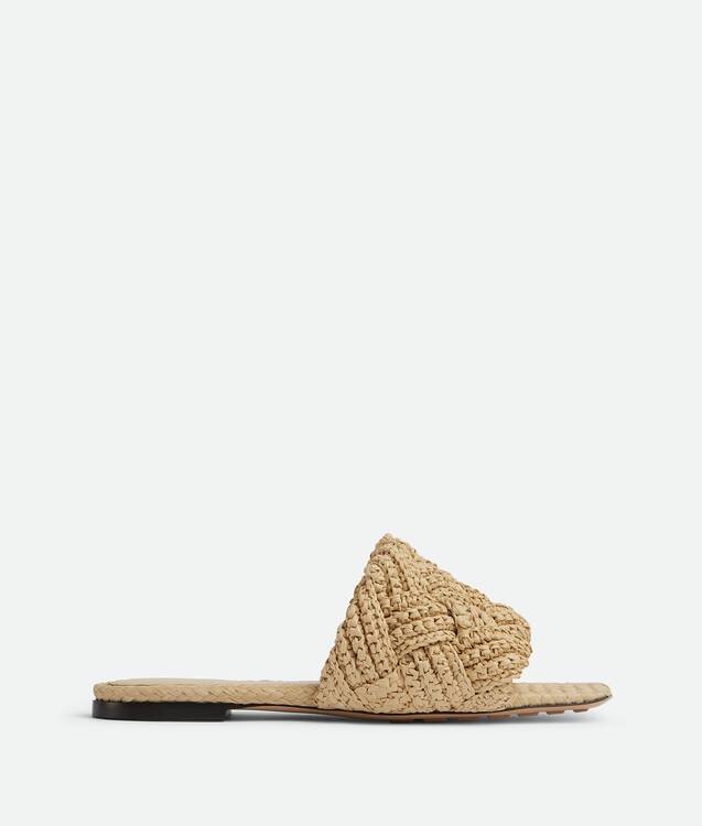 Bottega Veneta® Women's Lido Flat Sandal in Cane sugar. Shop online now.