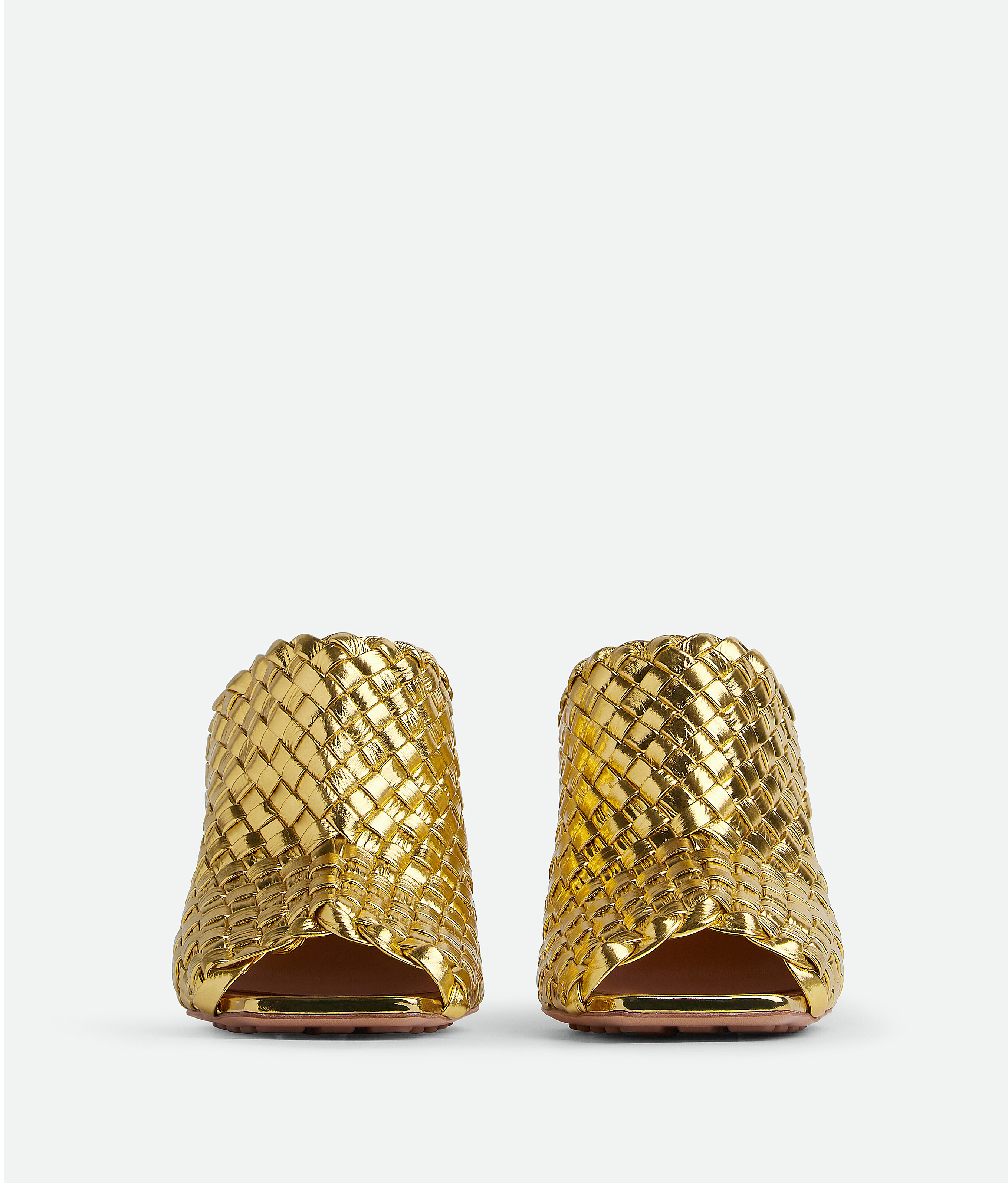 Shop Bottega Veneta Knot Mules In Gold